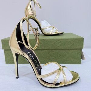 Gucci Women's Strappy Sandal in Metallic Platinum Leather